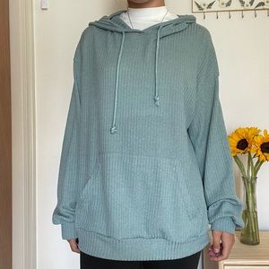 Teal Hooded Sweater
Size Small